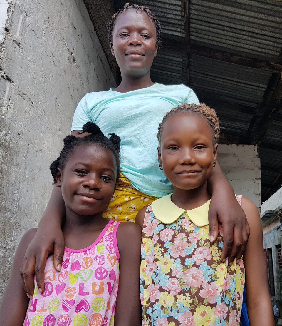A single mother nurturing two daughters with the support of SOS Children’s Villages in Liberia